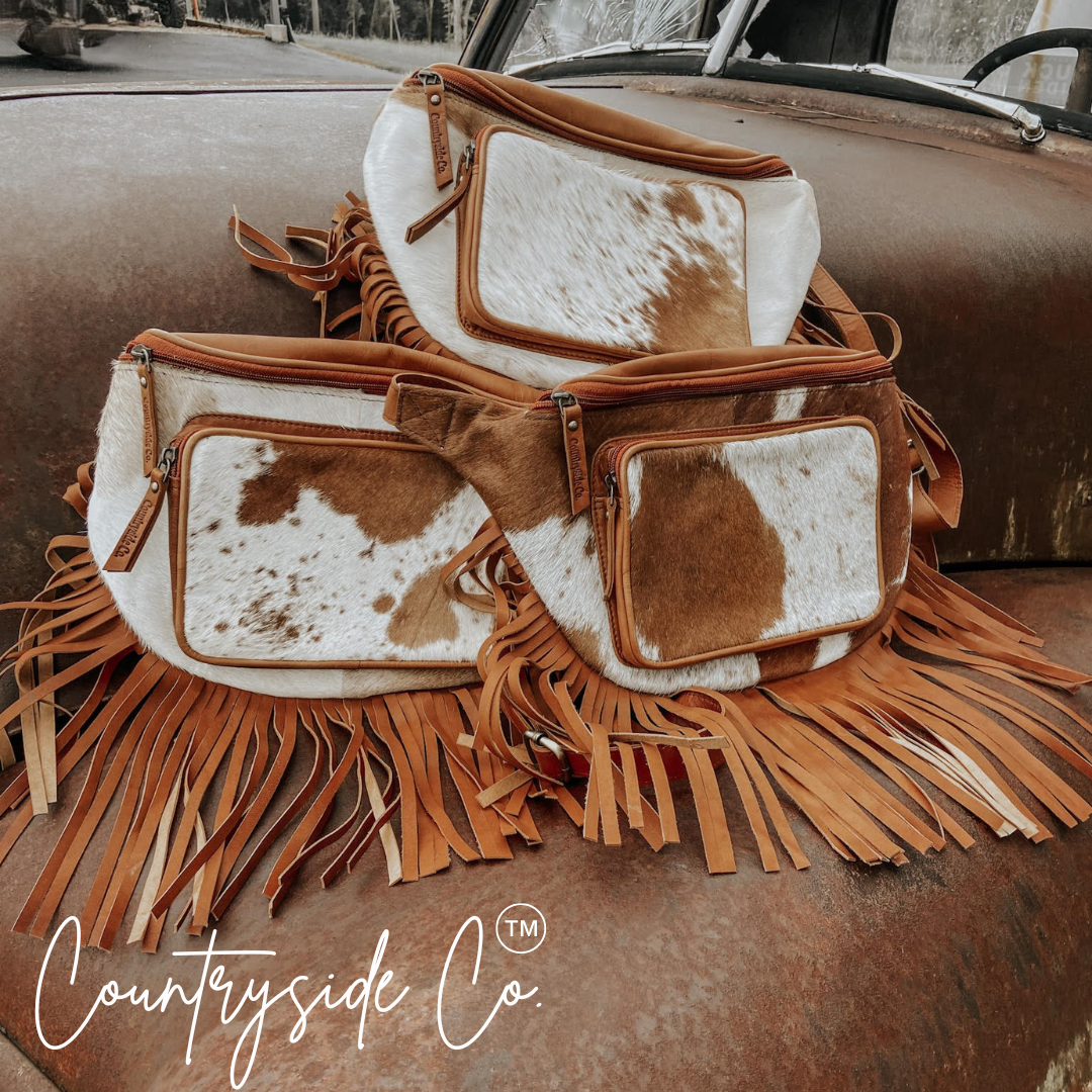 Addy Cowhide Sling Festival Bag