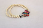 Pink Dahlia Turquoise Heart on a white coral beaded bracelet