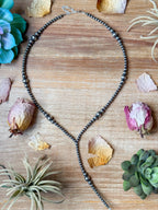 Lariat graduated sterling silver pearl
