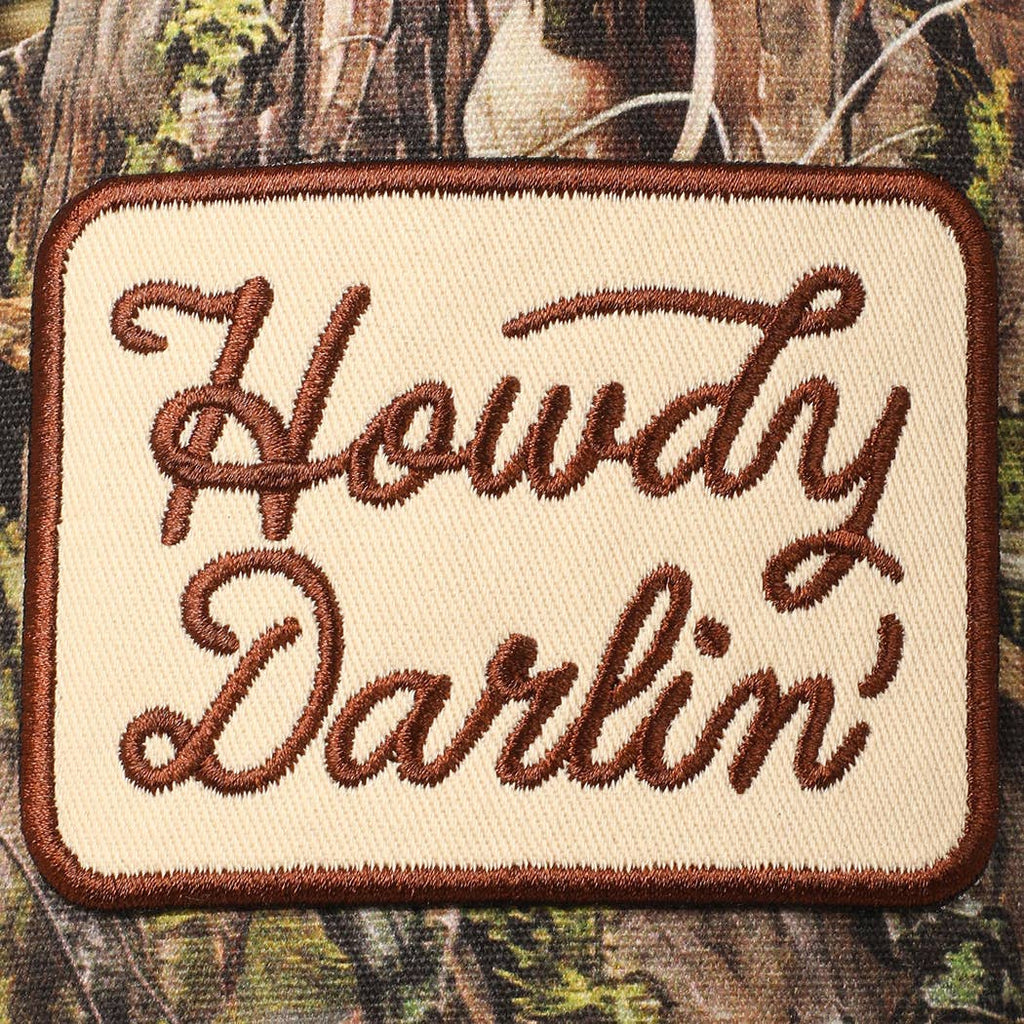 "Howdy Darlin'" Realtree Camo Patch Trucker Hat — 100% Cotton with Adjustable Snapback