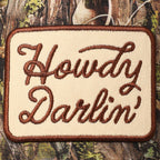 "Howdy Darlin'" Realtree Camo Patch Trucker Hat — 100% Cotton with Adjustable Snapback