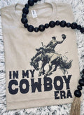 "In My Cowboy Era" Western Graphic Tee — Tan Jerzee Sublimation Print Wild West Statement