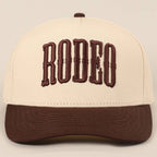 "RODEO" Two-Tone Embroidered Trucker Hat — Wine Red Cotton Canvas with Raised Lettering & 5-Panel Structure
